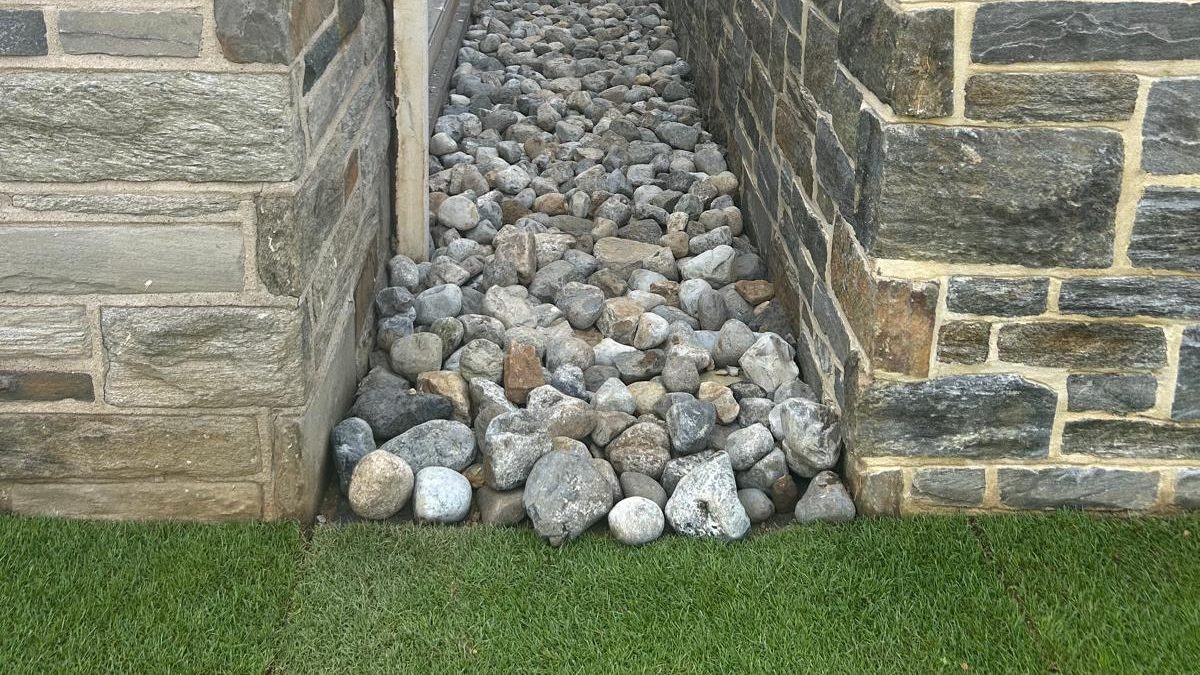 Commercial landscape maintenance preventing trip hazards.